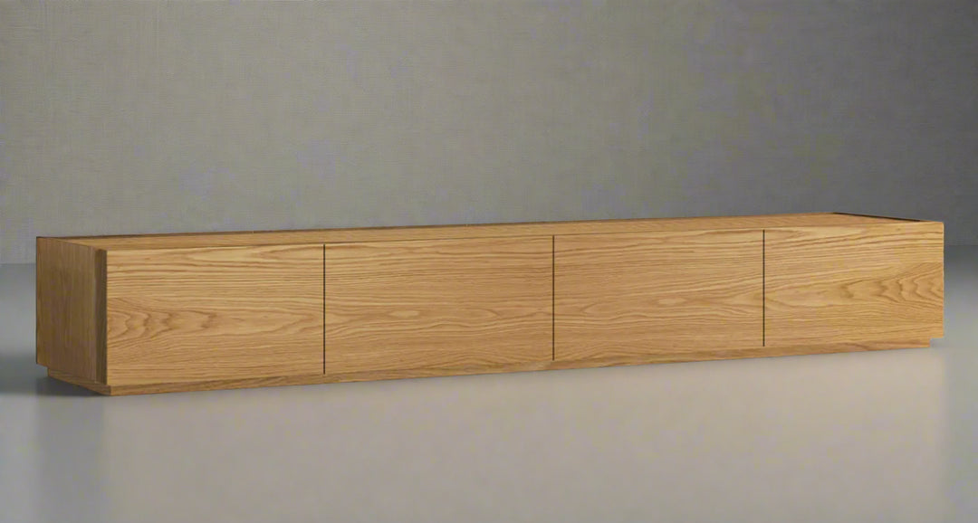 A beige ash wood veneer TV unit with four doors and one shelf, set against a white background.